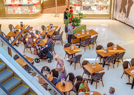 Brisbane, Queensland, Australia: 23rd September 2019: Overhead view of people dining in a food court at Westfield Garden City Shopping Centreのeditorial素材