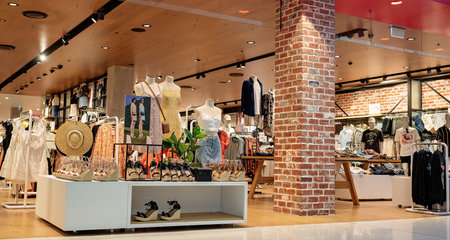 Brisbane, Queensland, Australia - October 2019: Male and female fashion clothing store in a busy...