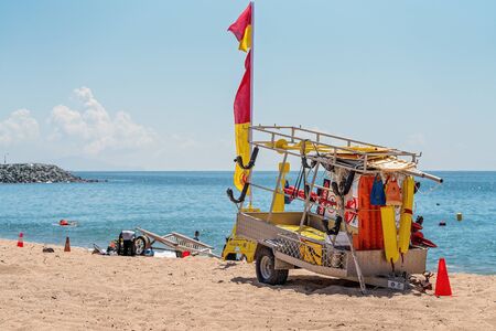 Mackay, Queensland, Australia - October 2019: Surf Lifesaving lifeguard equipment on a trailer in the sand at Harbour Beach on a bright summery dayのeditorial素材