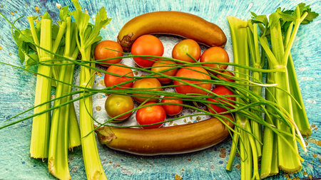 Celery, chives, tomatoes and eggplant , fresh and healthy home grown food