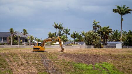 Mackay, Queensland, Australia: 3rd November 2019: Machinery lying idle on the weekend during work in a residential subdivision next to the Botanic Gardensのeditorial素材