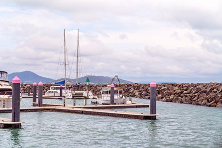 Yeppoon, Queensland, Australia - December 2019: Pleasure boats anchored at moorings at the marina