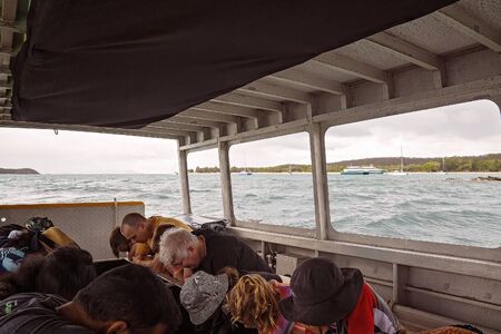 Yeppoon, Queensland, Australia - December 2019: Families of passengers enjoying glass bottom boat viewing of the coral reef near Great Keppel Islandのeditorial素材