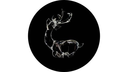 Round ball shape of a transparent glass reindeer against a black backgroundの写真素材