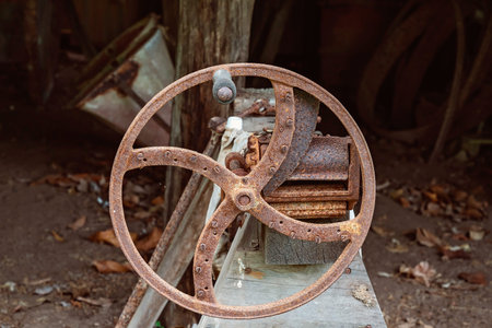 An old rusted chaff cutter which would have been used for chopping hay to feed animals by early...