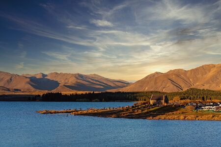 Sunset over The Church Of The Good Shepherd on Lake Tekapo in New Zealandの写真素材