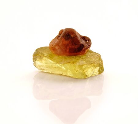 Extreme macro of two uncut gemstones at a height of under five millimeters, isolated on a white backgroundの写真素材
