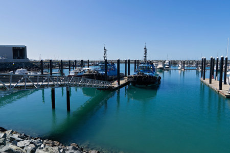 Mackay, Queensland, Australia - June 2020: Two tug boats moored at the marina