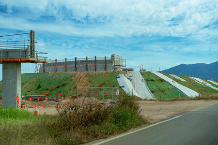 Construction works on a new country highway with the start of an overpass to replace the old road...