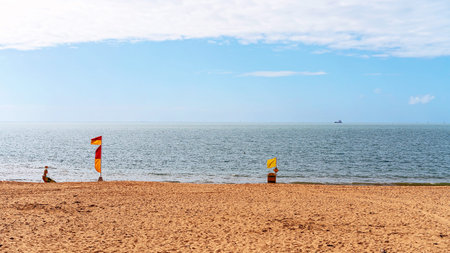 Surf lifesaving flags at the beach indicating where to swim