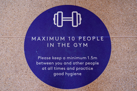 Townsville, Queensland, Australia - June 2020: Signage stating maximum number of people allowed in...