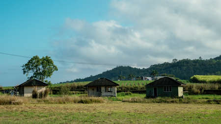 Three old houses relocated to a country site and allowed to go to ruinの写真素材
