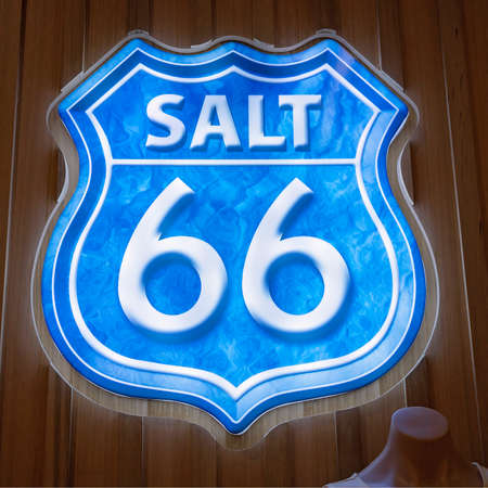 Townsville, Queensland, Australia - October 2020: Well lit Salt 66 signage on timber shopping center wallのeditorial素材