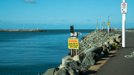 Mackay, Queensland, Australia - January 2021: Warning sign with lights for vessels at harbour entranceのeditorial素材