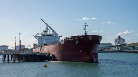 Mackay, Queensland, Australia - January 2021: Large container ship moored at the port wharf ready to lead produce from Australia to overseas marketsのeditorial素材