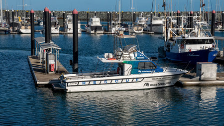 Mackay, Queensland, Australia - January 2021: A Sea Rescue boat moored at the marina on a calm sunny...