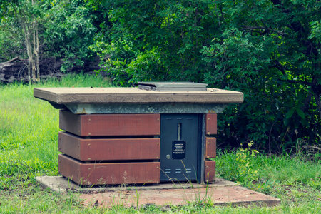 A public outdoor barbecue with concrete surface top and steel cooking areaの写真素材