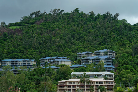 Airlie Beach, Queensland, Australia - February 2021: Tourism apartments located high on a bushy...