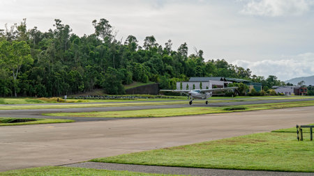 Airlie Beach, Queensland, Australia - February 2021: A light aircraft filled with skydivers taxiing along the runway prior to takeoffのeditorial素材
