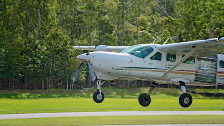 Airlie Beach, Queensland, Australia - February 2021: A light aircraft filled with skydivers takes...