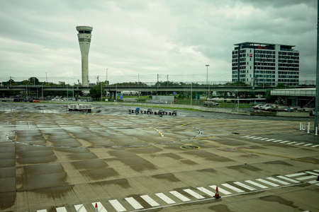 Brisbane Airport, Queensland, Australia - March 2021: Air traffic control tower and hotel at and near the airportのeditorial素材