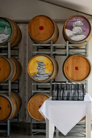 Brisbane, Queensland, Australia - March 2021: Decorated wine barrels on display in a winery...