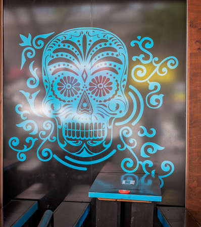 Brisbane, Queensland, Australia - March 2021: Blue painted skull signage outside popular restaurantのeditorial素材