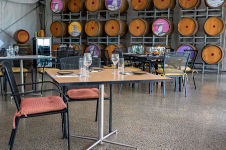 Brisbane, Queensland, Australia - March 2021: Inside a casual dining restaurant at a winery featuring decorated wine barrelsのeditorial素材