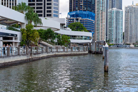 Brisbane, Queensland, Australia - March 2021: River walk against an office tower skylineのeditorial素材