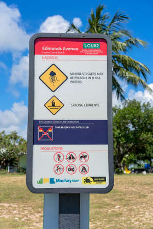 Mackay, Queensland, Australia - March 2021: Hazards warning beach signのeditorial素材