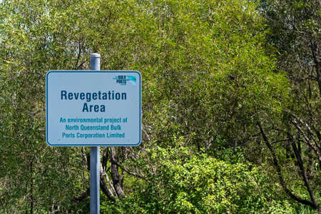 Mackay, Queensland, Australia - March 2021: Re vegetation area signage against a forest backgroundのeditorial素材