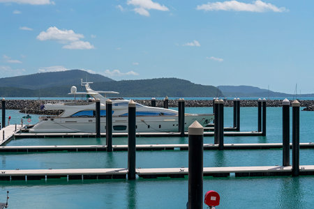 Airlie Beach, Queensland, Australia - April 2021: Luxury yacht moored at Coral Sea Marina