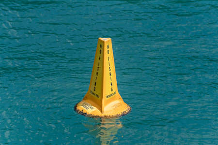 Airlie Beach, Queensland, Australia - April 2021: No fishing research area floating signのeditorial素材