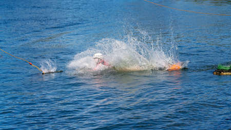 Mackay, Queensland, Australia - April 2021: A young girl learning to wakeboard at a cable ski parkのeditorial素材