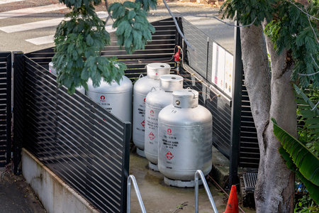 Airlie Beach, Queensland, Australia - April 2021: Gas bottle storage area at resort hotel