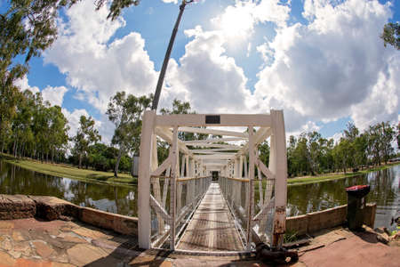 Clermont, Queensland, Australia - May 2021: A four wheel drive white car parked roadside in front of a field of sorghum fish eye lensのeditorial素材