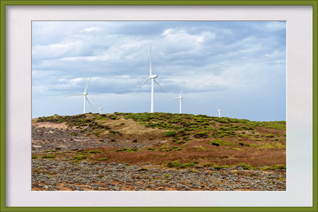 Framed Image of wind turbines on the coast of Victoria Australia in an area known for its petrified...