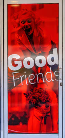 Mackay, Queensland, Australia - September 2021: Good friends sign on poster on wall of cafe in city centerのeditorial素材