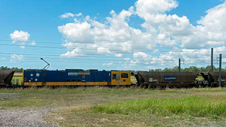 Koumala, via Mackay, Queensland, Australia - September 2021: Train transport industrial products to factoryのeditorial素材