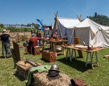 Eungella, Queensland, Australia - October 2021: Children looking through a viking village tent at a re-enactment fairのeditorial素材