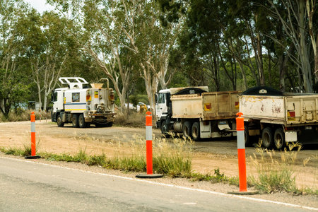 Bruce Highway Mackay to Townsville, Queensland, Australia - November 2021: Truck carting soil and...