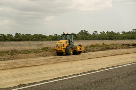 Mackay to Townsville Bruce Highway, Queensland, Australia - November 2021: Heavy machinery working...
