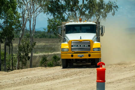 Bruce Highway Townsville to Mackay, Queensland, Australia - November 2021: A large truck working on highway road constructionのeditorial素材