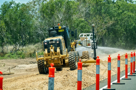 Bruce Highway Townsville to Mackay, Queensland, Australia - November 2021: Heavy machine working on...