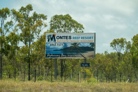 Bruce Highway Townsville to Mackay, Queensland, Australia - November 2021: Montes Reef Resort advertising sign for accommodationのeditorial素材