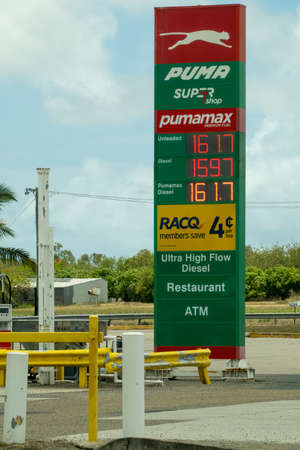 Bruce Highway Townsville to Mackay, Queensland, Australia - November 2021: Fuel prices on sign at service stationのeditorial素材
