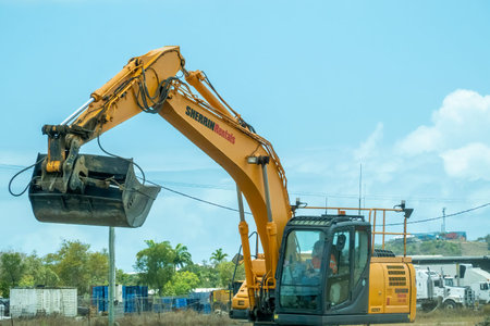 Bruce Highway Townsville to Mackay, Queensland, Australia - November 2021: Heavy machinery working on highway road constructionのeditorial素材