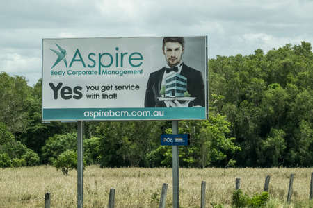 Bruce Highway, Townsville to Mackay, Queensland, Australia - November 2021: Aspire body corporate management outdoor signageのeditorial素材