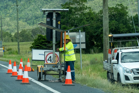 Bruce Highway, Townsville to Mackay, Queensland, Australia - November 2021: Traffic controller...