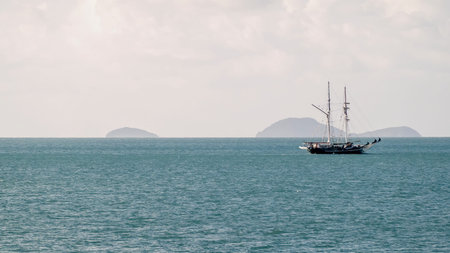Airlie Beach, Whitsundays, Queensland, Australia - April 2022:A replica sailing boat transporting...